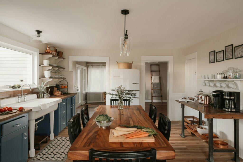 Farmhouse kitchen with dining table and island