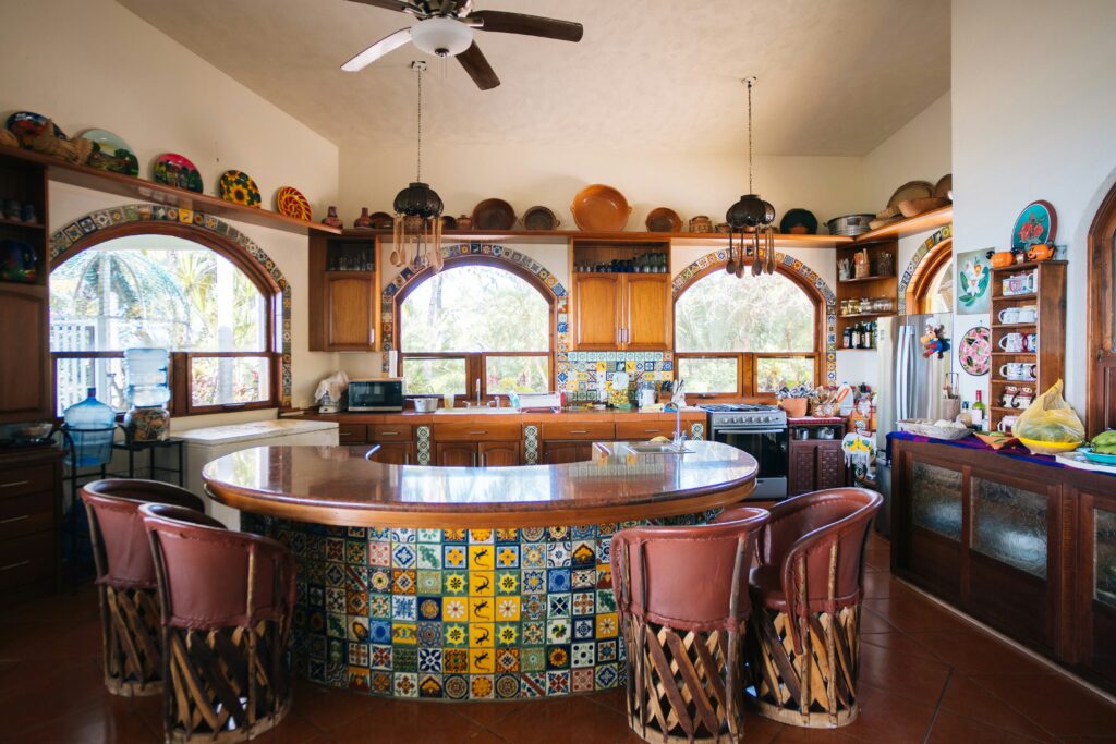 Spacious kitchen with large island and colorful tile details