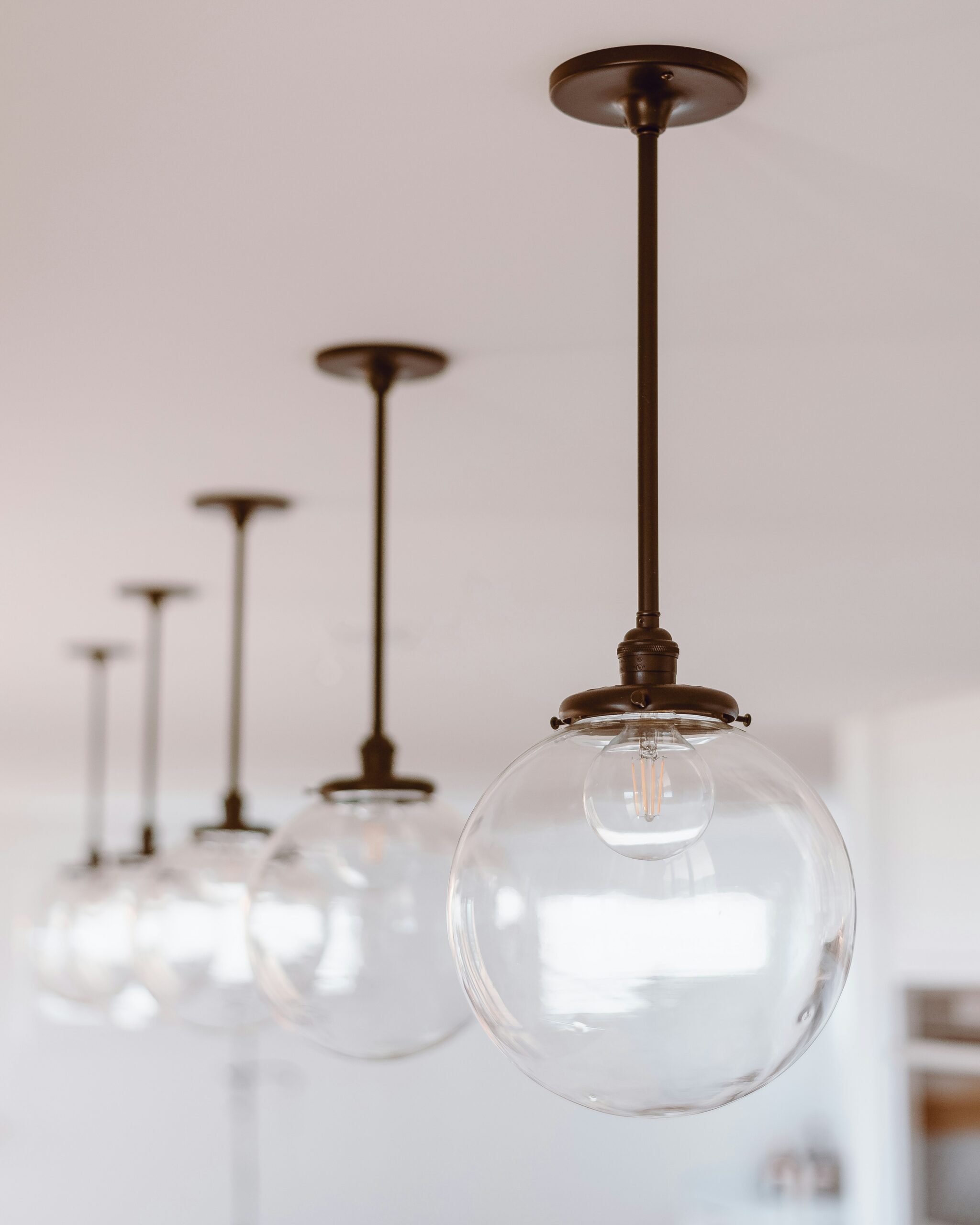 Clear glass light bulb with white background