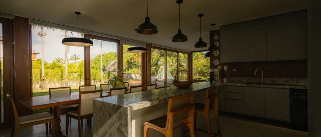 Modern kitchen and dining area with large windows